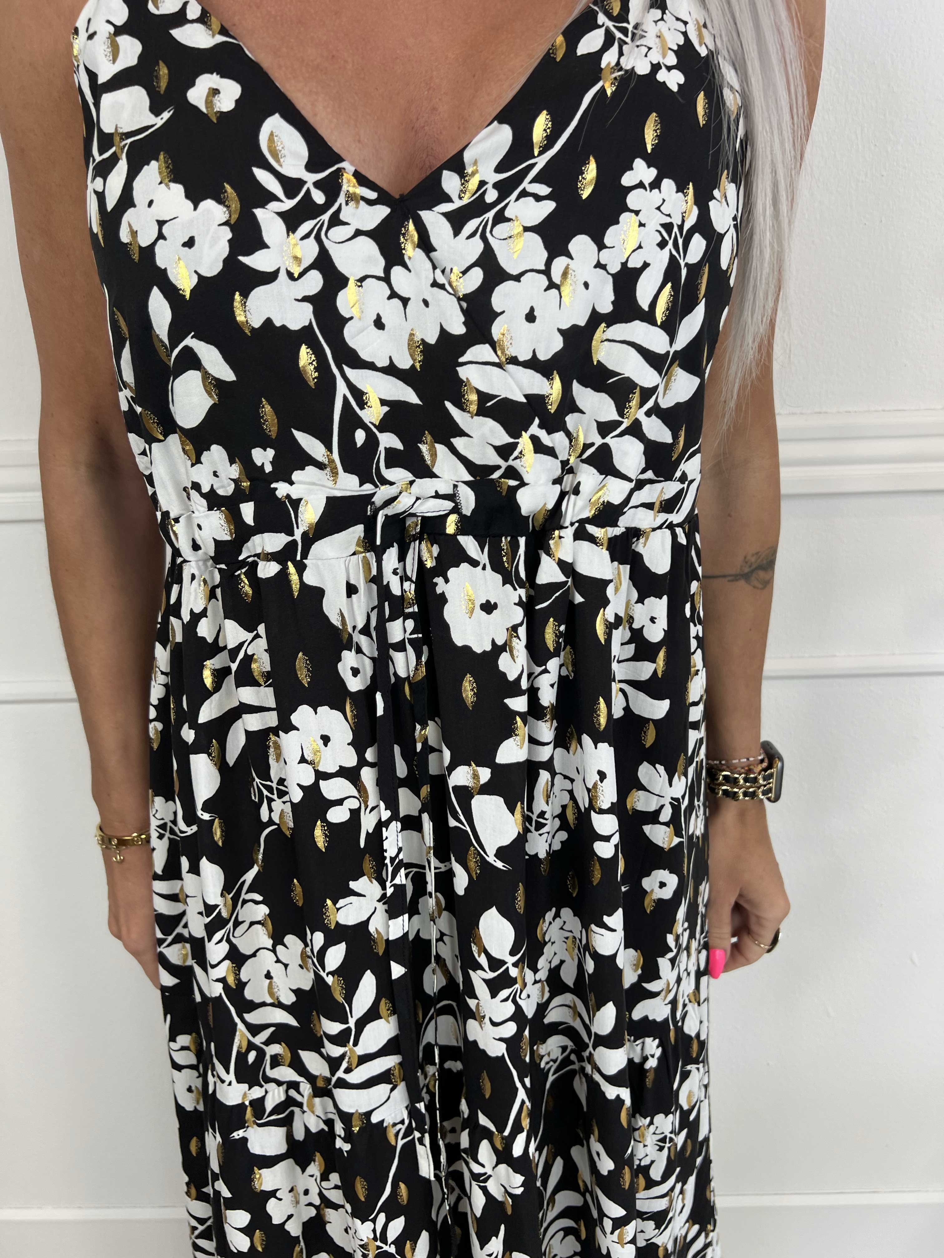 Lucie Flower - Viskosbandsklänning i blommigt tryck med v-ringning